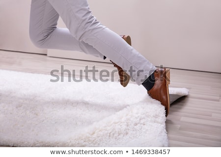 Stock fotó: Stumble In A Carpet