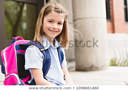 ストックフォト: A Portrait Of Cute Girl With Backpack Outside Of School