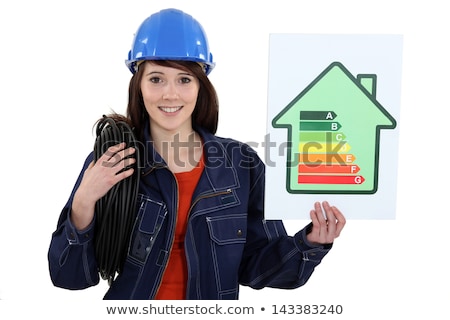 Stock fotó: A Female Construction Worker Promoting Energy Savings