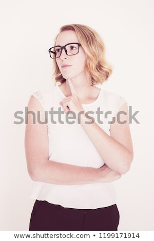 Stock photo: Close Up Of Thinking Saleswoman Against A White Background