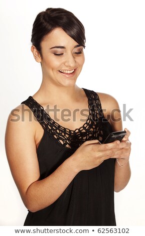 Stockfoto: Gorgeous Professional Woman Typing A Text Sms Message On Her Mob