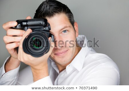 ストックフォト: Adult Man Photographer With Digital Camera Dslr Isolated