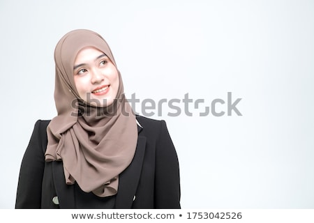 Zdjęcia stock: Young Female Looking At Something Above White Background
