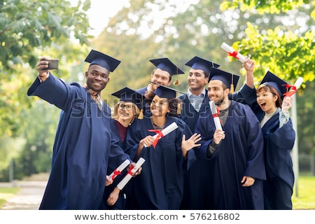 Stockfoto: Happy Graduates With Diplomas Taking Selfie