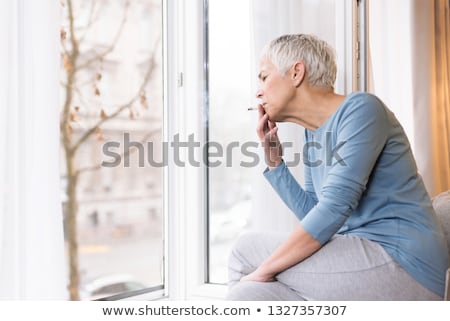 Foto stock: Beautiful Woman Smoking Cigarette Vith Copy Space