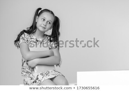 Сток-фото: Girl Schoolgirl On A White Background With A Backpack And Books