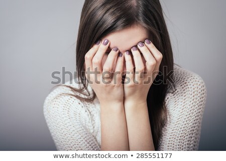 Stock photo: Surprised Woman Covered Her Face With Hands