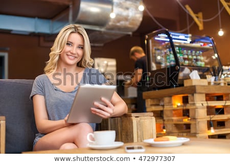 Stock fotó: Gorgeous Blonde Girl With Smartphone And Cup Of Coffee Indoors Woman Taking Selfie