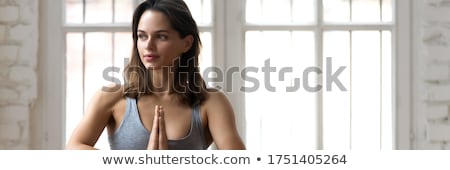 Stock fotó: Woman Make Namaste Gesture At Yoga Studio