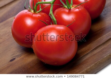 Tasty Red Ripe Tomatoes With Green Leaves And Water Drops Isolated Over Grey Background Natural Raw Сток-фото © Lizard