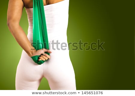[[stock_photo]]: Model In Gymnastics With Stretch Band