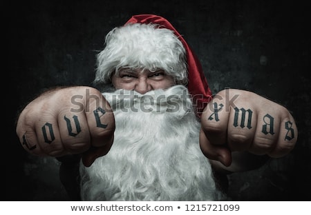 Stok fotoğraf: Santa Claus Tattooed