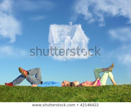 Stock photo: Lying Couple On Grass And Dream House Collage
