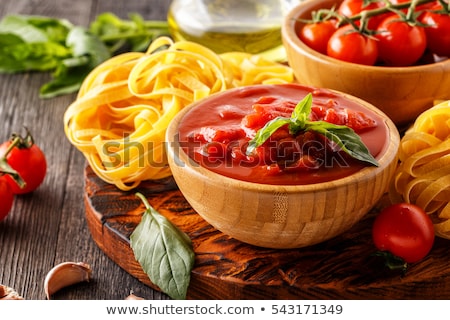 Foto stock: Tagliatelle Pasta And Tomato Paste