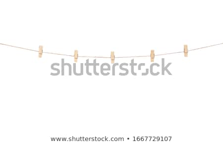 [[stock_photo]]: Five Clips On Wall