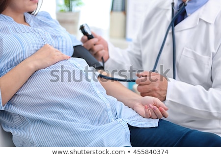 Stock photo: Doctor Measures The Pressure Of The Patient