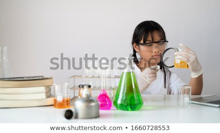 Stok fotoğraf: Learn Chemistry Concept Through Magnifier