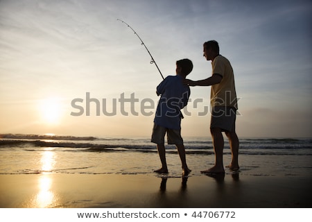 Father And Son Fishing Silhouette Imagine de stoc © iofoto