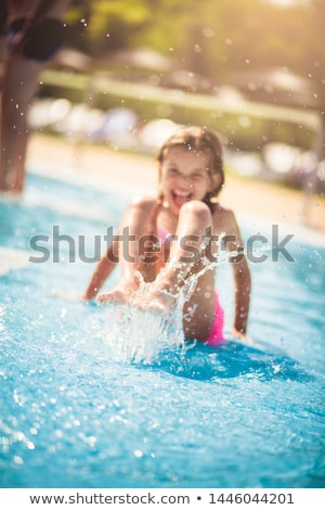 Foto stock: Child Has Fun In The Pool