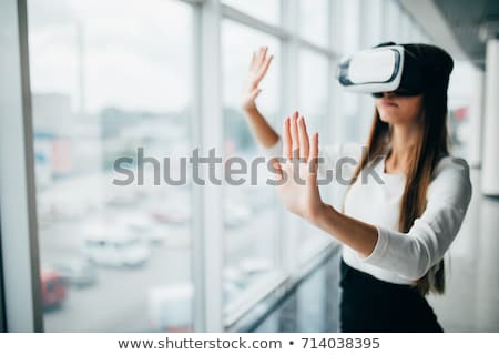 Stock foto: Beautiful Young Lady Wearing Virtual Reality Device