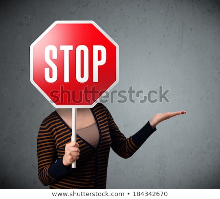 ストックフォト: Caucasian Business Woman Holding Stop Road Sign