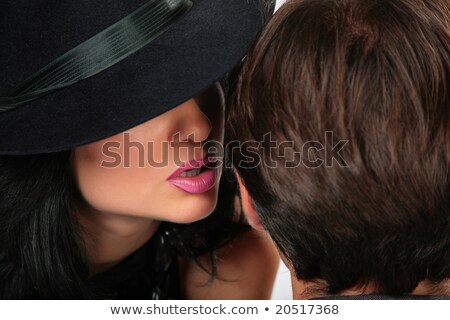 Foto stock: Woman In Black Hat Says Man