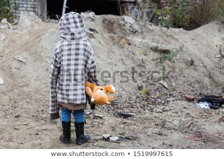 Stock fotó: Little Baby With Hat Hugging His Teddy Bear