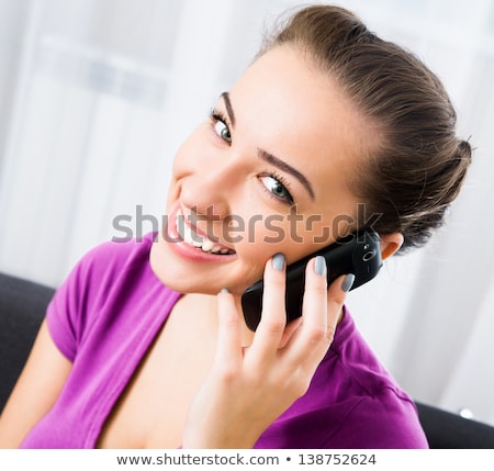 Foto d'archivio: Cute Teen Girl Communicating Or Texting With Her Smartphone Cartoon Vector Illustration Isolated On