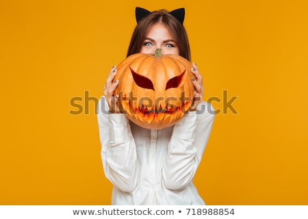 Foto d'archivio: Beautiful Young Woman In Halloween Costume Cat