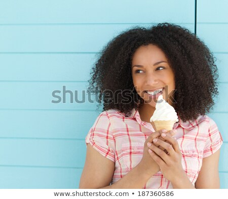 Stok fotoğraf: Happy African American Woman With Ice Cream Cone