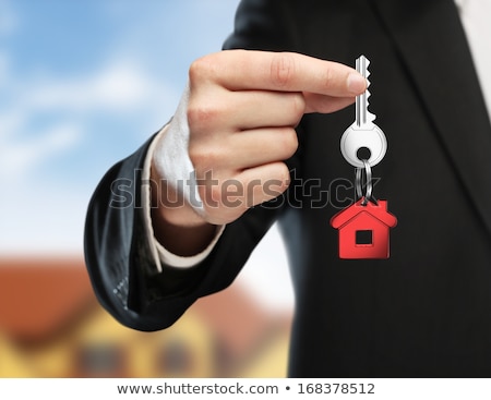 Foto d'archivio: A Real Estate Agent Giving Keys