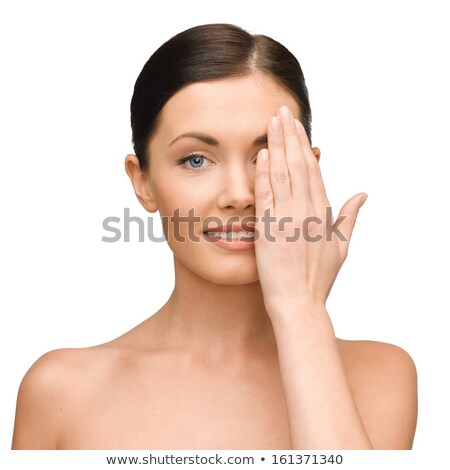 Stok fotoğraf: Beautiful Woman Covering Half Of Face With Hand