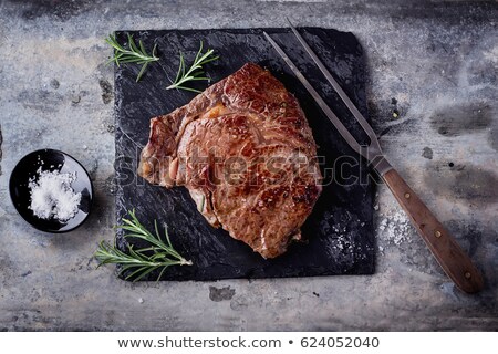 Stock photo: Grilled Beef Steak Topped With Butter And Rosemary