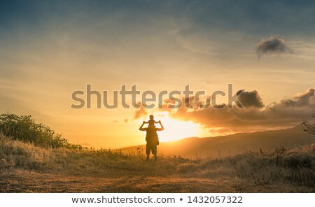 Stock fotó: Father And Son Hiking Through Mountains
