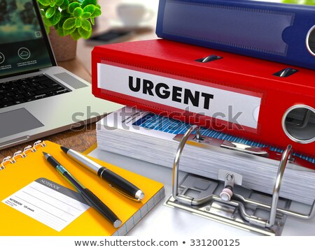 Stockfoto: Red Ring Binder With Inscription Urgent