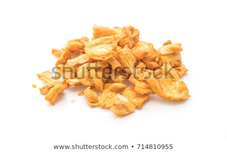 ストックフォト: Dried Dehydrated Deep Fried Pineapple Chips In A Wooden Bowl