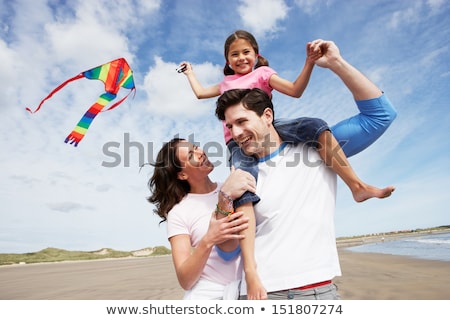 Stok fotoğraf: Three Kites Flying In Blue Sky