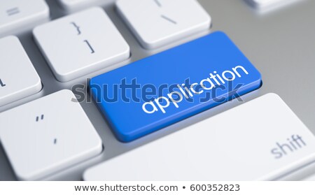 Stockfoto: Application - Caption On The Blue Keyboard Key 3d