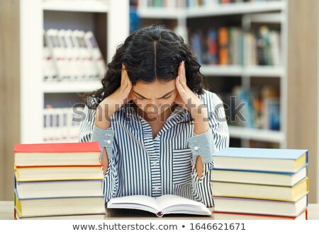 Stock photo: Female Student With Stack Of Books