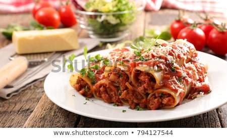 Foto stock: Cannelloni With Beef And Tomato Sauce