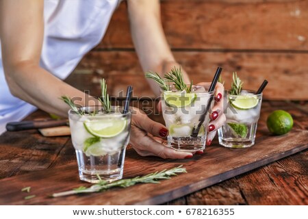 Zdjęcia stock: Tequila Girl Offers Alcoholic Drink In The Bar