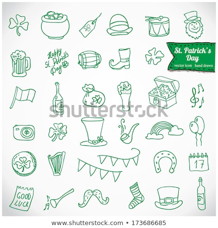 Foto stock: Glass Of Beer Bottle Horseshoe And Gold Coins