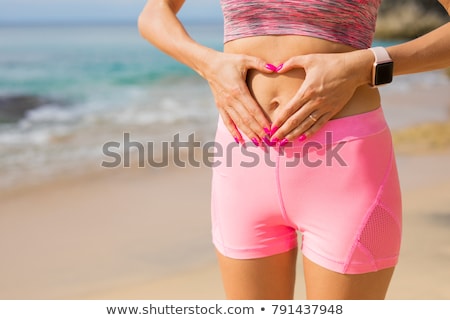 Foto stock: Woman With Stomach Pain Showing Digestion Sign