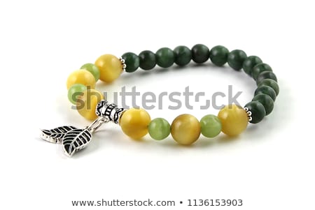 Stock photo: Silver Bracelet With Green Gemstones