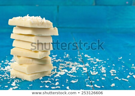 Сток-фото: White Chocolate Stack On Blue Background