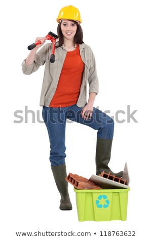 Foto stock: Woman With Bolt Cutters Stood With Recyclable Waste