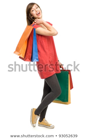 Foto stock: Studio Shot Of Teenage Girl With Shopping Bags