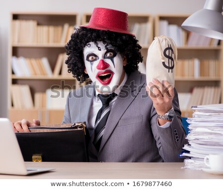 Stok fotoğraf: Clown Thief Steals Money