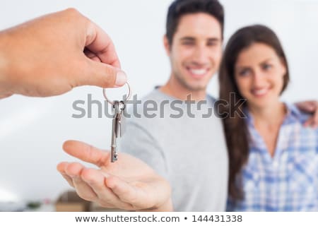 Stock fotó: A Woman Being Handed Keys