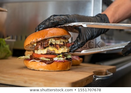 Stock fotó: Chef Cook Making Food At Restaurant Kitchen